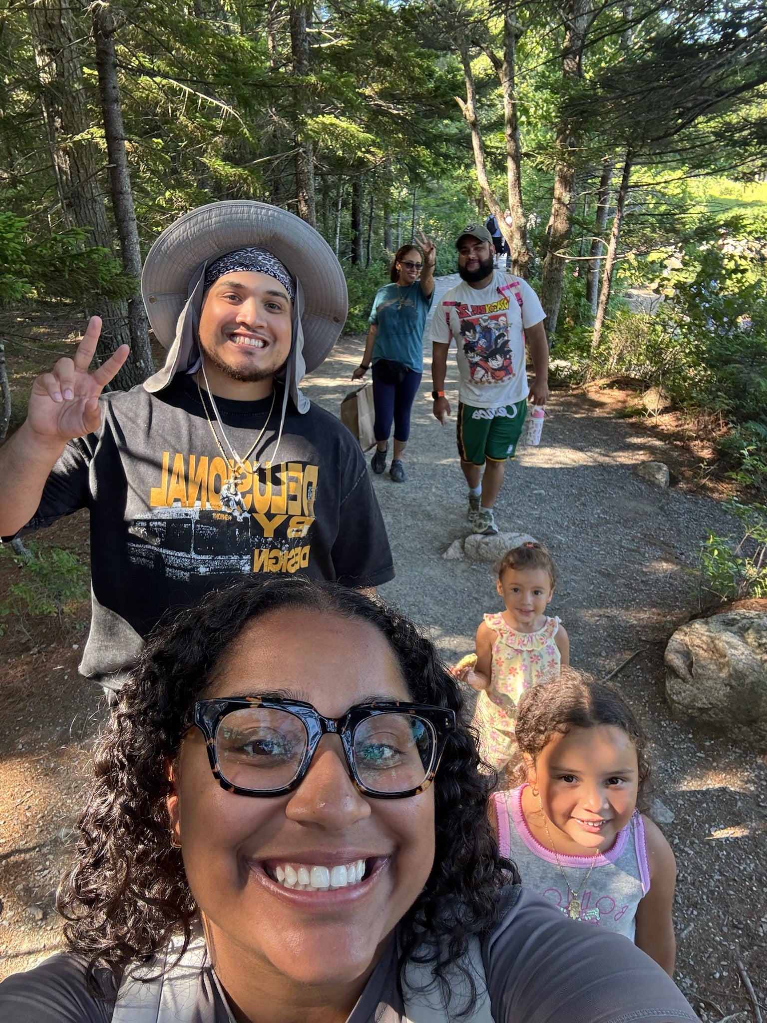 Family hike along the boardwalk trail near Jordan Pond, Acadia National Park